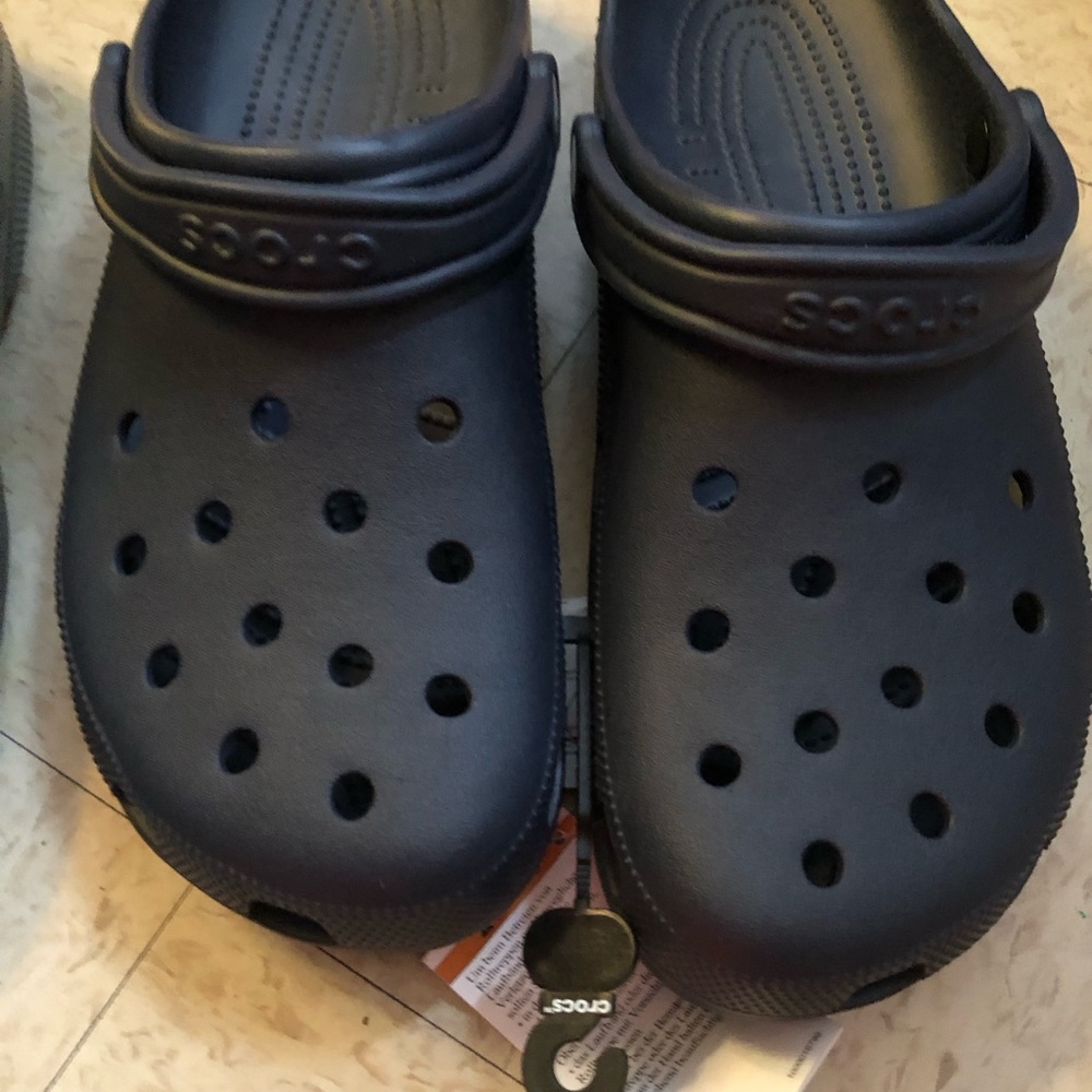Brand new tags still on Crocks.Size 13 both.Blue and Grey are the colors.